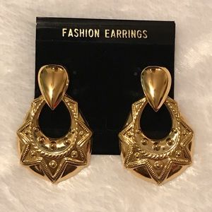 Tribal gold tone dangle pierced earrings
